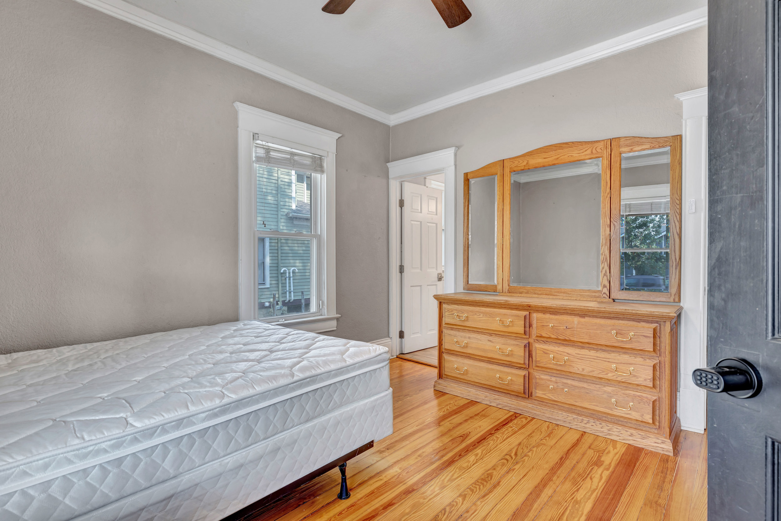 Furnished main-floor bedroom with keyless lock