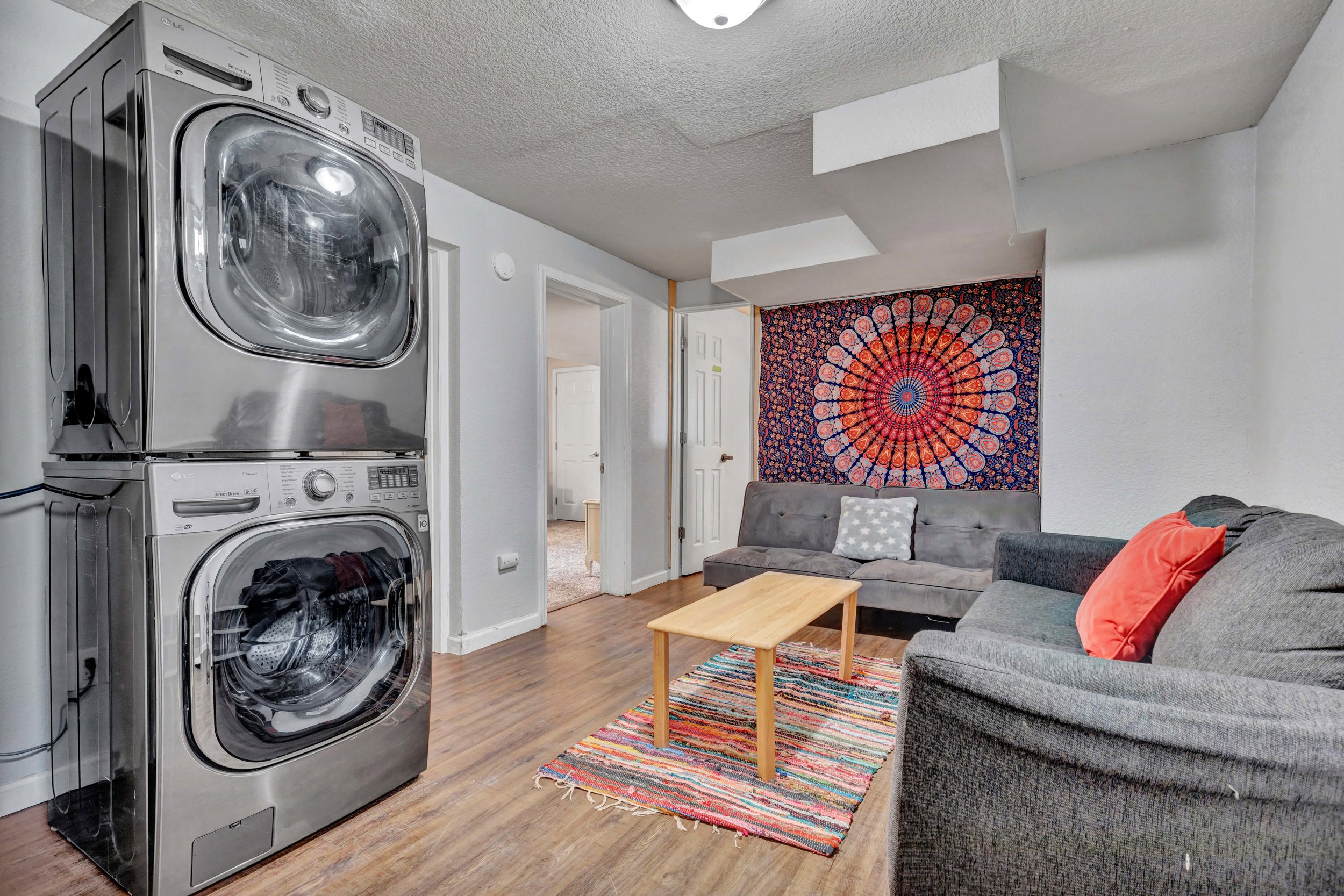 Lower-level living space with in-unit washer and dryer