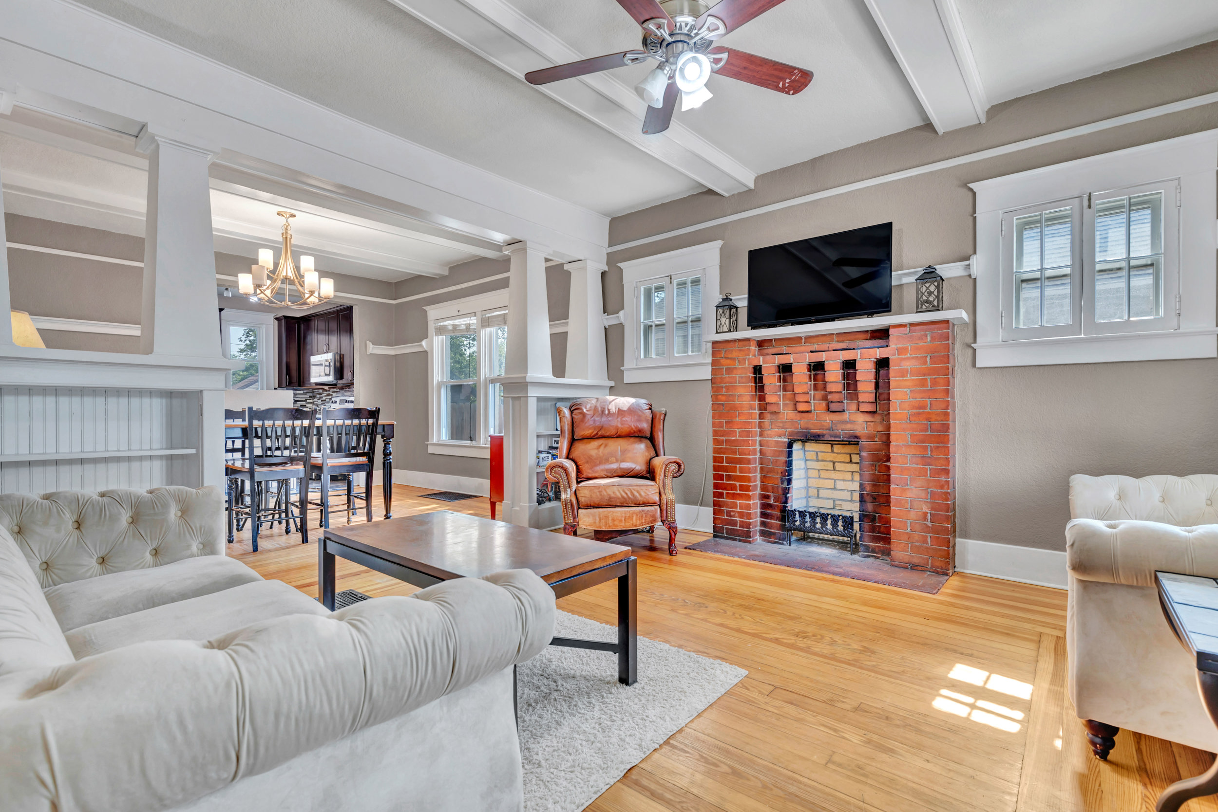 Living room open to dining and kitchen